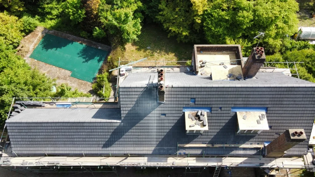 New tile roof in Surrey by Astral Roofing and Building Ltd