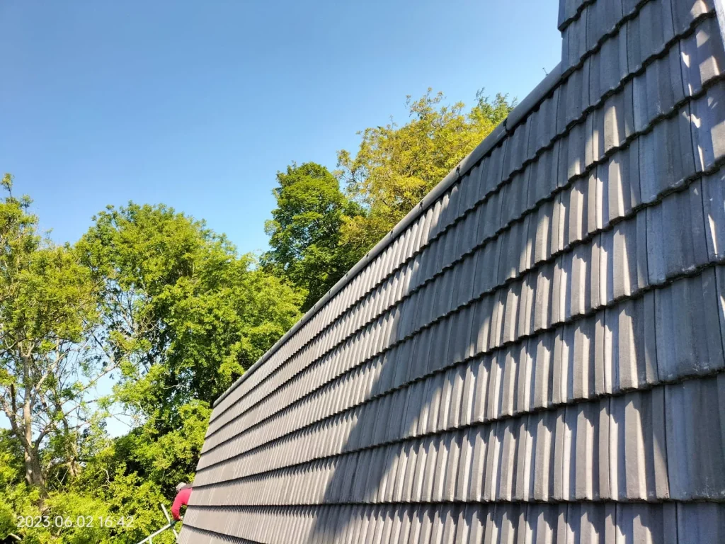 New tile roof in Surrey by Astral Roofing and Building Ltd