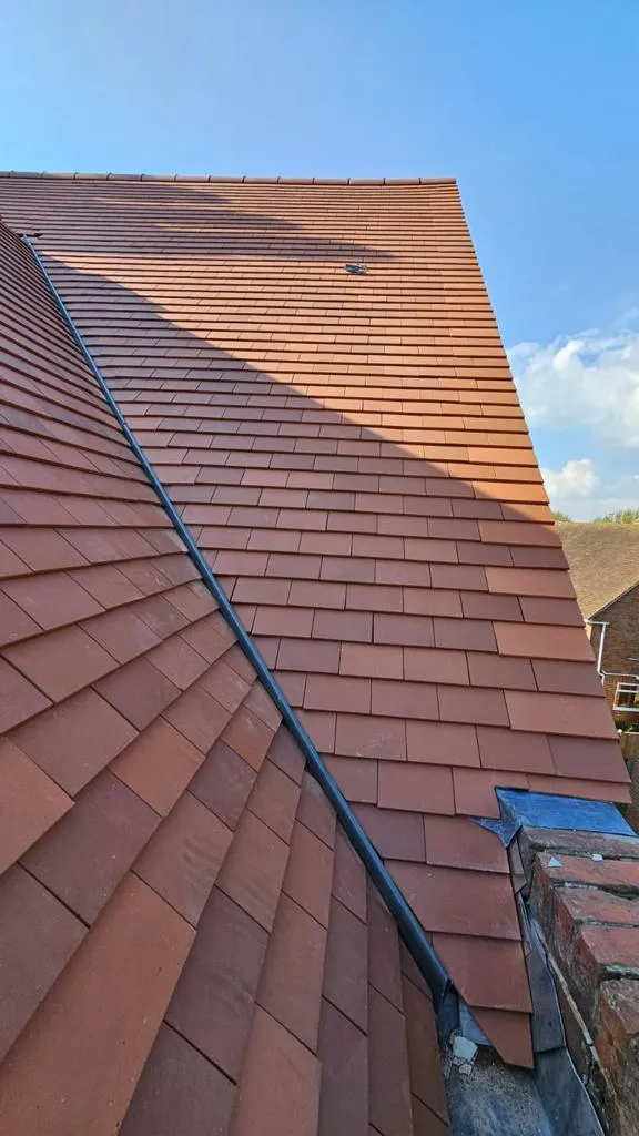 New tile roof in Surrey by Astral Roofing and Building Ltd